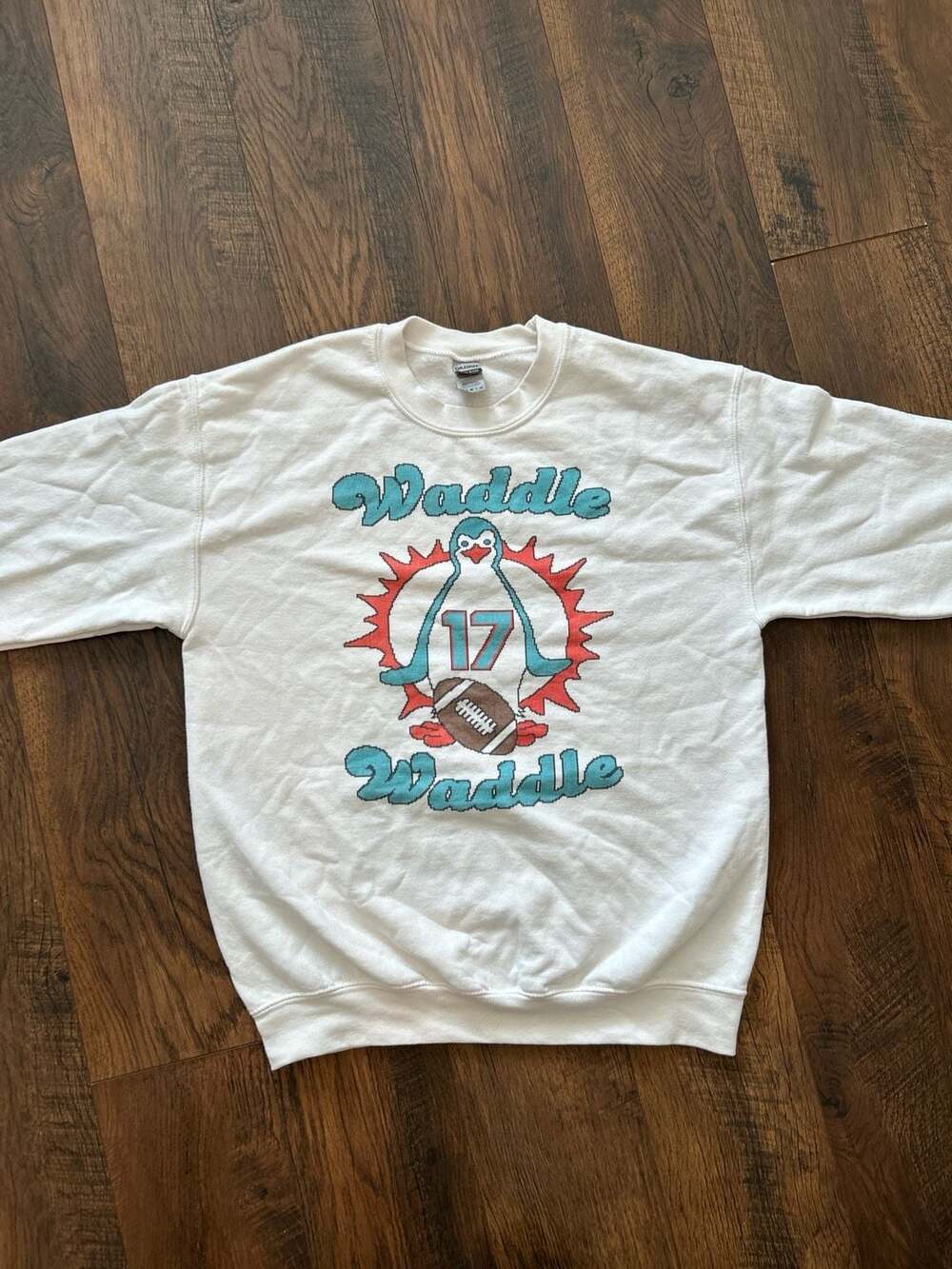 Barstool Sports Jaylen Waddle "Waddle Waddle" Miami Dolphins Penguin Sweatshirt